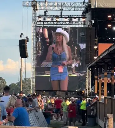 Fans Cringe As ‘Hawk Tuah’ Girl Appears At Country Music Festival, ‘She Hawked Her Last Tuah’