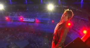 Tom Cruise Jumps From Stadium Roof During Closing Ceremonies