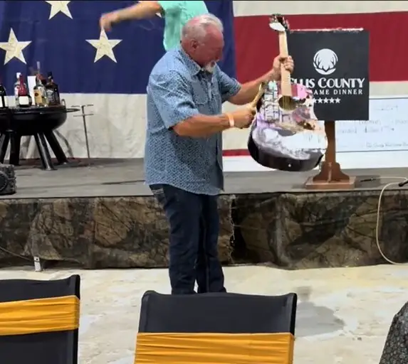 Man Buys Autographed Taylor Swift Guitar At Auction, Immediately Destroys It