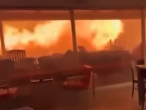 Terrifying Footage Shows 2 Men And A Dog Stuck In House Surrounded By Fire