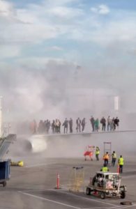 American Airlines Airplane Caught Fire, Forcing Passengers To Climb Onto Wing